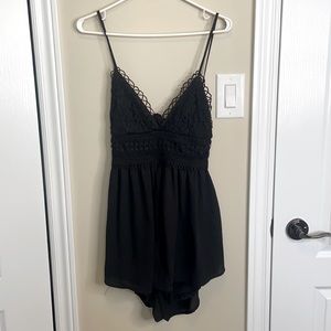 Romper with a crochet detail on the top!